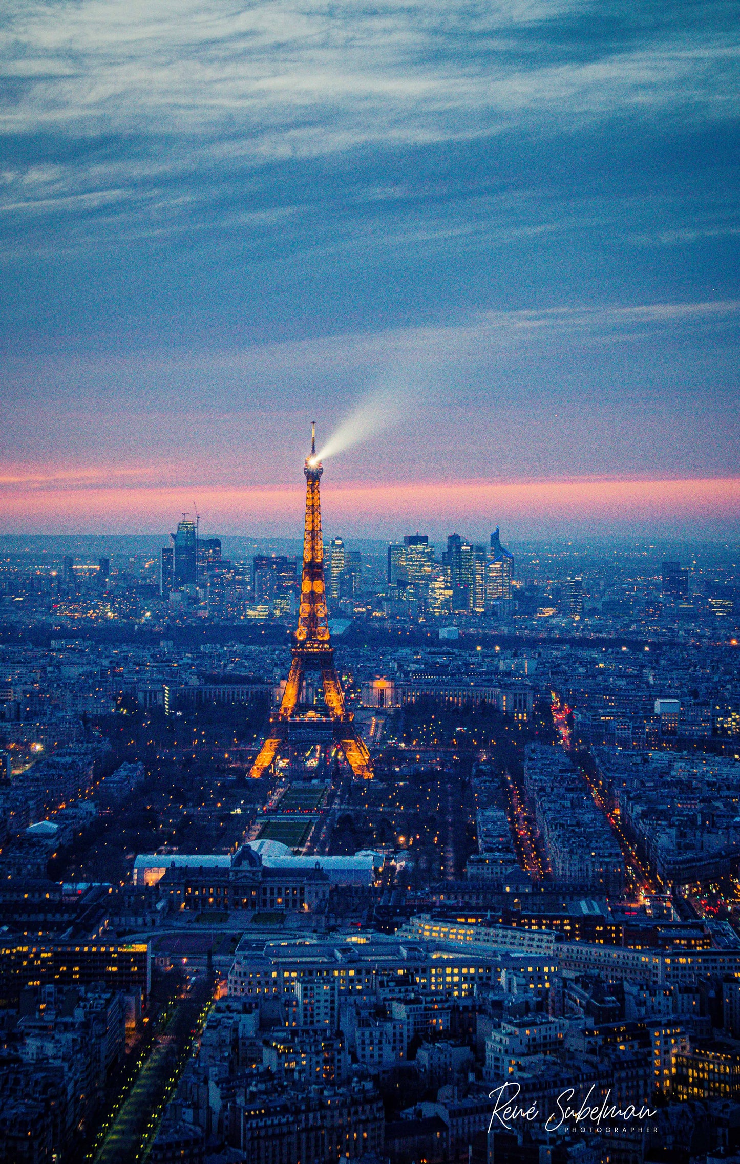 Sunset over the Eiffel Tower, available in a 50 x 70 cm size.